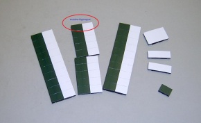 Magnetsymbol für Stundenplan, halb dunkelgrün-halb weiß
